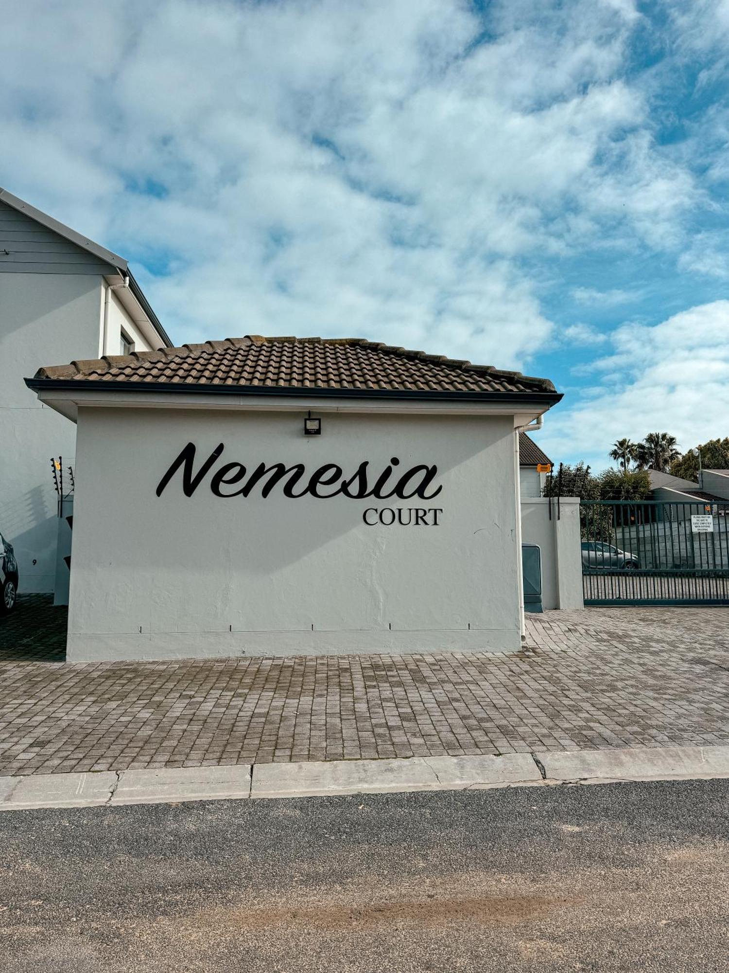 Апартаменты Nemesia Court Дурбанвиль Экстерьер фото